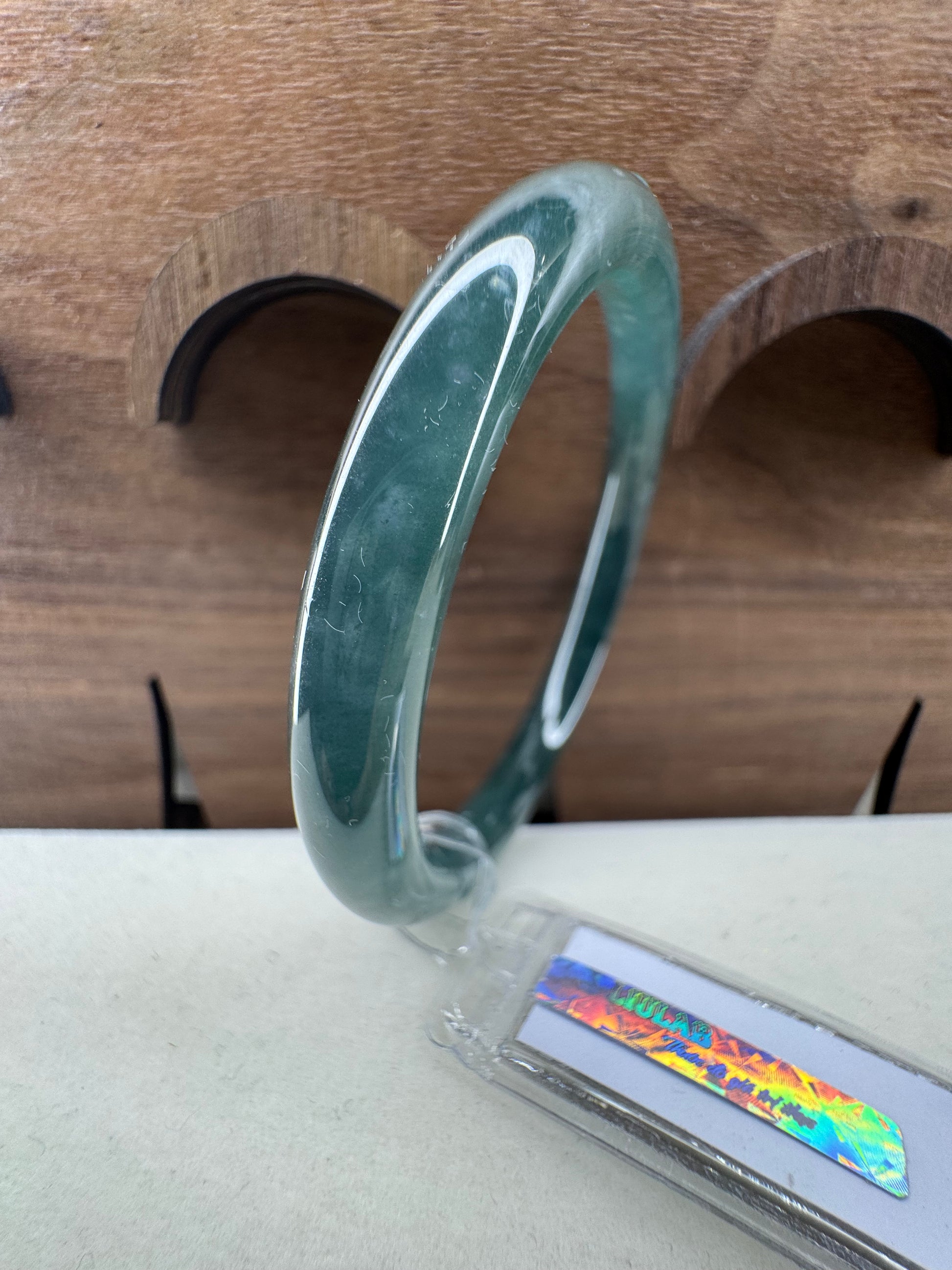 Pale White Snow flakes inside Green Classic Round Bangle